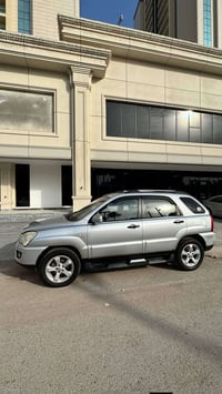 سبورتج 2009 وارد كوري محرك 2000 كير مكينة مكفول رقم بغداد السيارة مكفو...