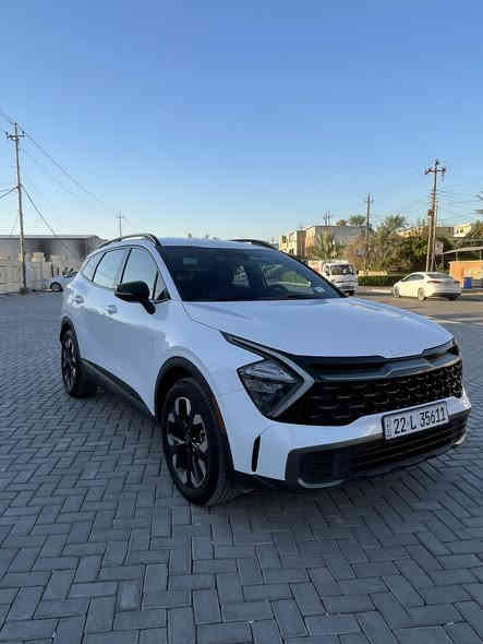 السلام عليكم ورحمة الله وبركاته 
تفاصيل كامله بالمنشور 
كيا سبورتج موديل 2023 وارد امريكي اربيل بأسمي السنويه 
فئه الاكس لاين الطويله 
مواصفتها 
بصمه دخول بصمه تشغيل تحكمات بالستيرن كروز ساعه شاشتين جبيره كاميرا خلفيه  حساس خلفي وحساس امامي رادرات اماميه جانبيه كراسي جلد كرسي سايق كهرباء قطعتين تبريد +تدفئه بالكراسي تبريد لمس فور ويل تشغيل واطفاء ذاتي عن التوقف نضام اوتو هولد نضام مانع انحدار وشاحن لاسلكي + مخرج شحن بالمقاعد الخلفيه ..سايد بريك بصمه
مكينه حجمها 2500 ممفتوحه لا هيه ولا الكير 
ماشيه 42 الف 
حادث السياره بابتين مبدلات نفس اللون وبكد كف الايد صبغ بالجاملغ الخلفي 
+ تصليح داخل الباب الخلفي..
الدعاميه  الاماميه والخلفيه مكفولات من الصبغ ومن الفتح 
تبريد السياره بلادي 
صدر السياره مال شركه بلادي 
بدلت بيها تخم تاير وبدلت تخم دسكات فقط لاغير 
عنوان السياره بغداد العامريه 
سعر السياره 215 ورقه 
رقم التلفون 
***********
