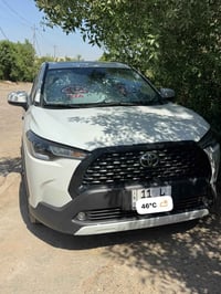 للبيع كورلا كروس موديل 2025 هايبرد رقم بغداد مكفوله   مواصفاتها فتحة س...