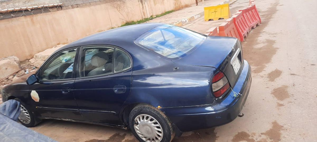 سلام عليكم  موجوده دايو لكنزا موديل 2001 مصبوغه عام رقم بغداد مشروع وطني شرط  التحويل السنويه تسقط 2027 السياره عوزها (مكينه )والباقي كوله مكفول تخم تاير حداديه كير كهربائيات كولها شغاله خير من الله السعر ٢٨ وبيها مجال للطيبين الله شاهد هذا سعرها وخسران بيها رقم تلفون ***********
