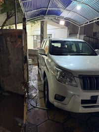 برادو  كويتي 2012 رقم بغداد انكليزي جديد باسمي السيارة مكفولة من الصبغ...