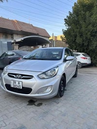 اكسنت 2013 محرك 1.600 خليجي ماشيه  200 الف رقم نجف دولي بأسمي سنوية نه...