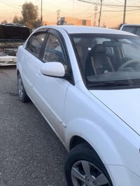 كيا ريو 2012 مكرك كير شرط   مكينه 16  تحكمات استيرن  جامات كهرب  اشاير...