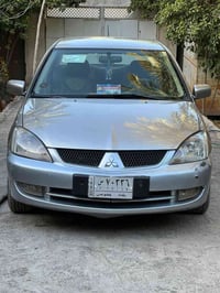 لانسر ٢٠١٠ • باسمي • بدون ضربه