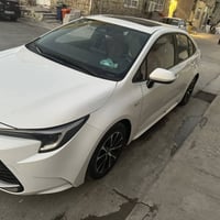 كورلا هايبرد موديل 24مكفله كفالع عامه الموصفات فول داخل احمر كشن كهربا...