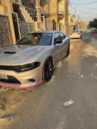 دوج جارجر موديل ٢٠٢٣ لون سلفر Gtرقم بغداد  ماشية 23 الف ميل حادثها موض...