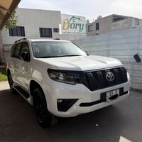 برادو 2023 ( SAS) ام الضمان TXS رقم بغداد  فول الموصفات ماشيه 34 الف ك...