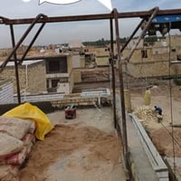 تصعيد مواد بناء • تصليط • تزفيت