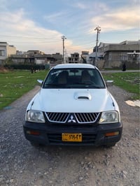 ٢٠٠٢ • كاربراتير • تاير جديد