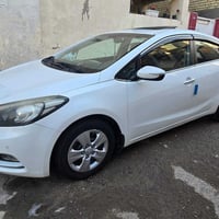 كيا سيراتو موديل 14مفول مواصفات رقم بغداد محرك 1600 رقم صاحب السيارة 0...