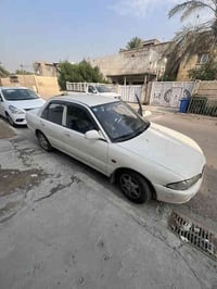 بروتون 2004 السيارة حلوة ما بيها نقص  مكينه و كير بلادي مكفولات  تبريد...