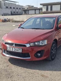 لانسر قرش موديل ٢٠١٦ خليجي مكفوله من الصبغ والتبديل محرك ٢٠٠٠ رقمها سل...