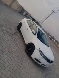 سياره مديل سيراتو 2012 مكفوله ضربه وتبديل حداديه تخم تاير سنويه منتهيه...