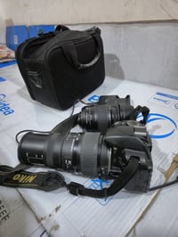 نيكون D3100 • موصل • عدسة عاطلة