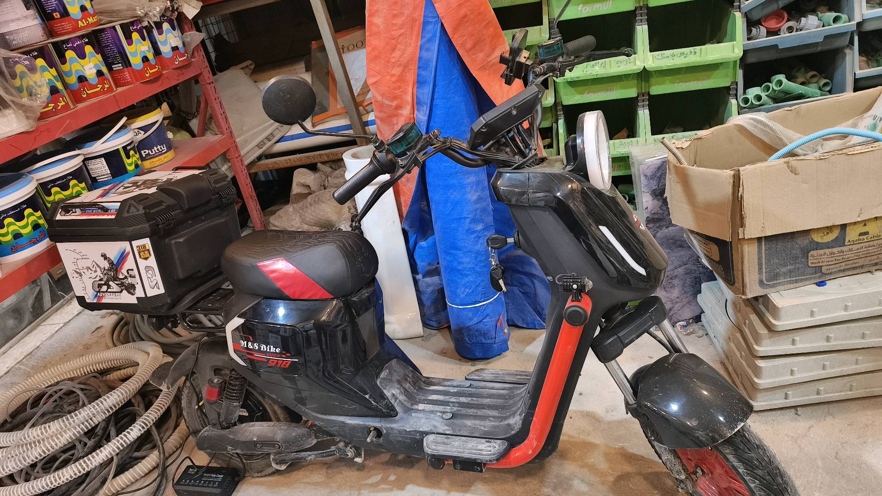 عنوان بغداد البياع دراجه شحن باتمان 4(بطاريه اكبارالشحنه الوحذه تمشيك 60كيلو)(مديل 25سرعه60) مستخدمه شهرين على يدي وكفوله كفاله عامه بس الشاشه متحركه الفيشه مالتهه السعر 500وبيه مجال قليل