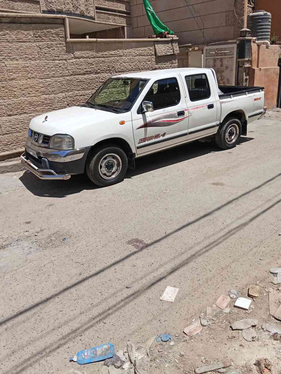 نيسان بيكم 2010 جام كهرباء داخل ماروني للبيع مكان السيارة بغداد ***********
