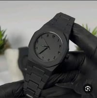 ساعة سوداء • أرقام عربية • الموصل