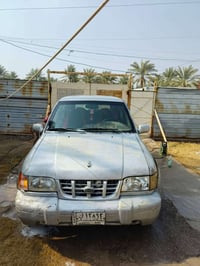 كيه سبورتج 2001  السياره خير من الله  المكينه مسكر بدايه تنقيص  الكير ...