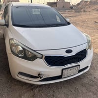 كيا سيراتو موديل 14  بغداد سنويه لل 28  سياره متجيه بدون لقود ودواخل ب...
