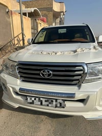 من رخصه الادمن المحترم تيوتا لاندكروز 2014 رقم بغداد دولي ب اسمي السيا...