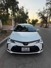 كورلا ٢٠٢٥ هايبرد شكل خليجي مكفولة كفالة عامة  عداد المشي 16 الف فقط ف...