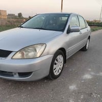 لانسر • ضربة وتبديل • كفالة مكينة