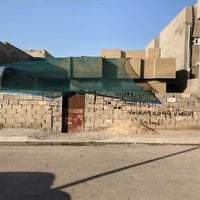 القصر الأوسط الشهداء • ٢٦٠م • واجهة ١٣م