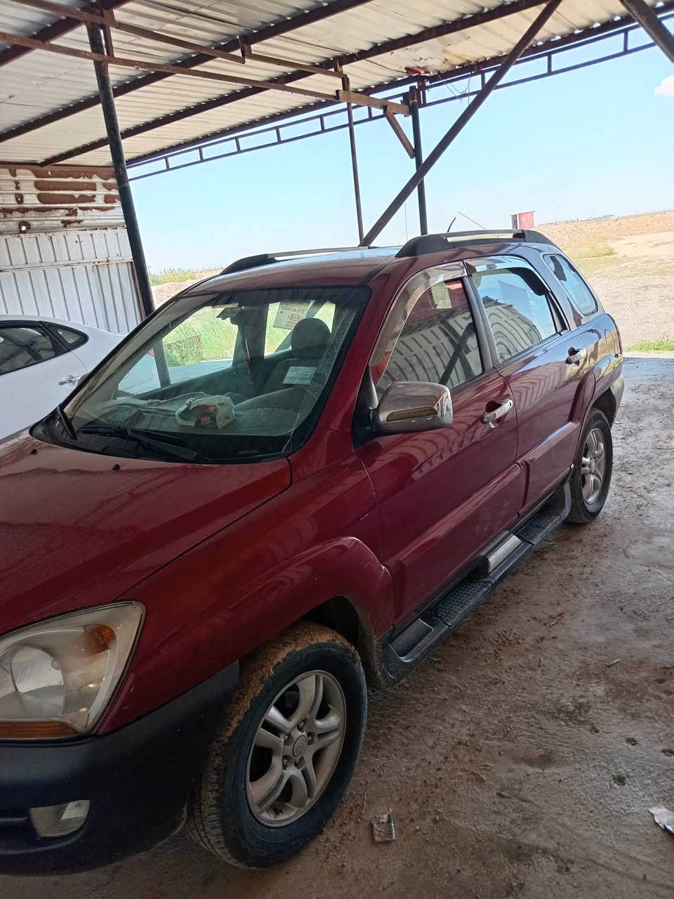 كيه سبورتج 2005 كلين مابيها بس البنيد معير كير شرط محرك 6/2700بي تنقيص يعني جبنه تدفئ تبريد كامله كركوك بسمي سنويه ل٢٠٣٠ /***********/السعر ٩٠ورقه
