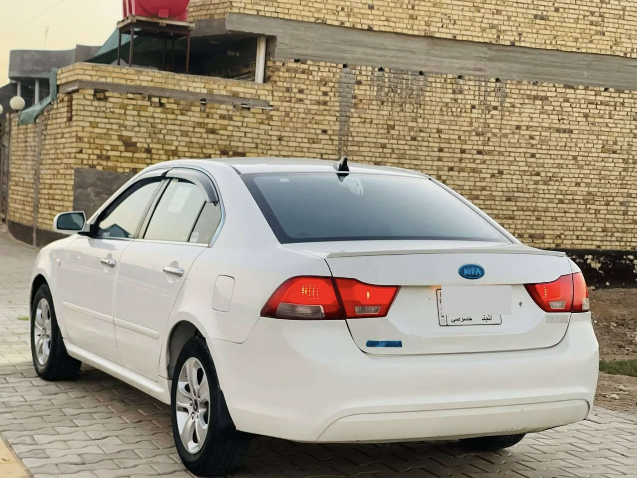 كيا اوبتما 2009خليجي بيهه قطعتين  الجاملغ الخلفي والباب الخلفي   رش  بدون دواخل مكينه 2000دوش رقم نجف مشروع وطني مكينه كير حداديه تخم تاير تبريد تدفئه كله جديد السياره جاهزه مال جناي مكان السياره بابل السعر 112وبيهه مجال ***********
