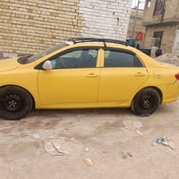 ياالله كورلا موديل 2009وارد امريكي سياره جاهزه من كلشي محرك ١٨٠٠ السعر...