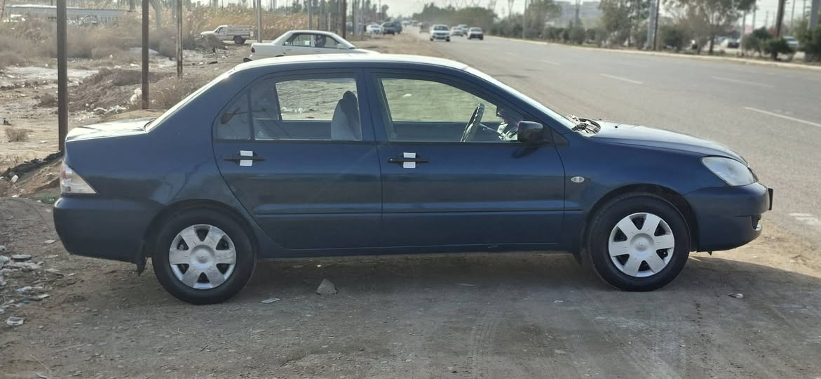 السلام عليكم
لانسر 2010 

سياره جديده مكفوله عدا بارد بالجاملغ الخلفي ونص الدوسه صبغ فقط 
السياره على وضع الشركة
السياره باسمي سنويه وهزه لل2027 كير مكينه مكفول تبريد تدفئه بشرط 

للتواصل *********** 

السعر 87  وكلشي اكو بالسوك
