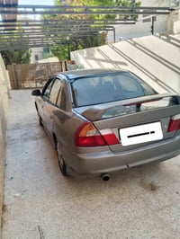 لانسر ١٩٩٩ • اوتوماتيك • ١٦٠٠ سي سي
