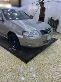 السلام وعليكم   نيسان سني ٢٠١٢ للبيع رقم بغداد   السياره خليجيه بيها ح...