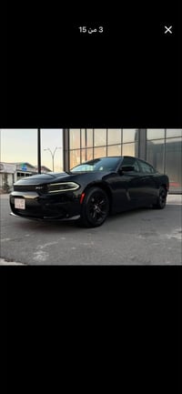 چارجر SXT • اسود • ٤٢ الف ميل