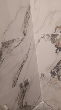 خلفه سيراميك بورسلين كاشي شغل هندسي متفرغ حالياً 07817766336