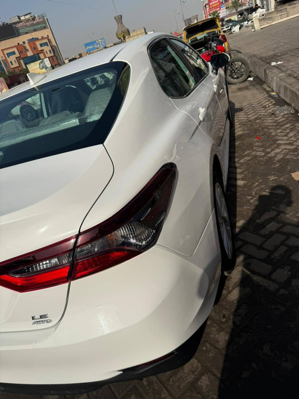 السَلٱمٌ عـَلـْيگمّ-ۈرحـْمّـٌة ٱللـّہ ﯙبُرگـّاتہ
TOYOTA  CAMRY     2023
للبيع تويوتا كامري ( LE )
وارد امريكي 
لون أبيض 
فور ويل.   AWD
رقم بغداد بسمي أني مستوردهة 
تحويل ثاني يوم
ضرر السيارة
بنيد وجاملغ  شادهن أصلي وكالة مال شركة اومصبوغات
اوبل نقل صار بيهة رصعة بل هلال جاملغ خلفي معدل بل بي دي ار 
بيهة ايرباك راجع سستم بلادي مال شركة يعني أشتريت إرباكات اصلية مال تفصيخ اوشادهن 
محرك أربع سلندر  2.5   بانزين
مواصفات السيارة 
كشن جلد وكهربائي
شاشة كبير لمس
تحكم استيرن جهتين
سايد بريك كهربائي بصمة
تجغيل عن بعد 
كامرة خلفية 
مثبت سرعة 
رادار امامي
تحديد مسارات 
3 أنظمة (ECO)(NORMAL)(SPORT)
حساسات ويل أمامي وخلفي 
حساسات مانع انزلاق أمامي وخلفي  ABS
لايتات امامي (LED) عدسات زينون ببلادي 
بروجكتر عدسات زينون
كفرات بروجكتر لداد 
حواجب شباك اعلى لداد 
مضخم صوت دمام بلادي
ماشية السيارة  46 ميل على مشي امريكة 
ملاحظة السيارة أصلحت كل غراضهة  أصلي اي قطع بل سيارة شديتهة اصلي يعني لا جديد  ولأ تجاري 
سعر السيارة  210 $ وبيها مجال بصيط لين السيارة امكافتني اكثر من هاذ السعر بهواي صرفت عليها  رجعتها مال وكالة لين يجي ايشوف السيارة حت سونار أكلي مارد 
وبل عافية على ياخضه 

أستفسار رقم هاتف : *********** 📞
