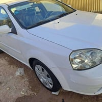 للبيع اوبترا موديل 11 رقم ذي قار بسمي بيها صبغ باب السايق فقط وباقي تك...