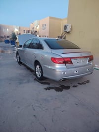 ازيرا 2009 • فول مواصفات • فتحة سقف