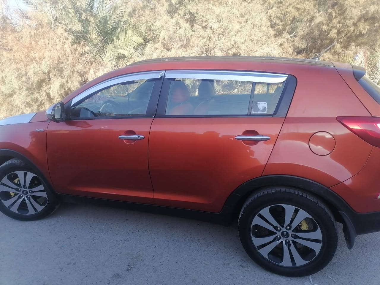 كيا سبورتج موديل ٢٠١٢ خليجي ماشيه ١٤٦ الف بيها قطعتين صبغ السياره جاهزه باسمي رقم بغداد  السعر ١٣٥$ وبيها مجال بسيط موقع السياره الانبار قضاء عنه تلفون ***********
