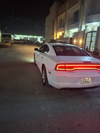 جارجر موديل 12  حادثها جاملغ وباب يمنه ابيع صبغ حزام السياره كلشي بيها...