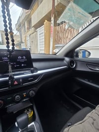 كيا فورتي موديل22 ماشيه 69 الف بيها ضربه خفيفه بل باب عكس سايق للاستفس...