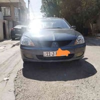 لانسر موديل ٢٠٠٦ للبيع رقم بغداد انكليزي بسمي سنويه لل ٢٠٣٠ مصبوغه عام...