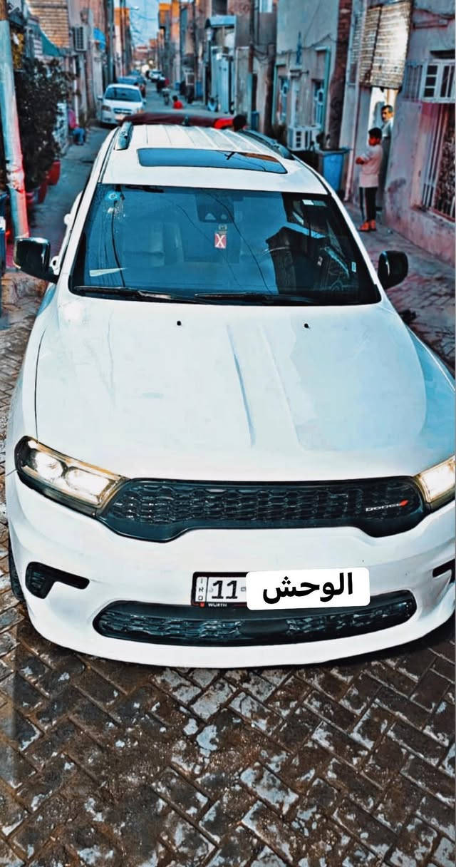 سلام عليكم
دودج دورانكو  GT PLUS 2023 🇺🇸

 🚩
حجم المحرك : V6 (3.6L)
اللون: ابيض

السياره نظيفه دهن موبر وكالة .
عداد المسافة :56mi  

الحادث : فقط  ع كد مسطره صبغ الجاملغ الأمامي جميع الايرباكات سليمة 🚦

المواصفات فول 1/1✅

فتحة سقف
تشغيل عن بعد
مقعد السائق خزن 
رادار امامي ( تثبيت مسار مع مانع تصادم )
رادار جانبي ( نقطة عمياء )
ماسحات تشتغل اوتوماتيك مع المطر
مانع تصادم خلفي 
كامرة خلفية دواره
كشنات تدفئةوتبريد
ويل كب حجم 20 كروم
ستيرن رياضي على شكل حرف D مع تدفئة 
كشنات تحكم كهرباء 
شفتات ستيرن
دخول ذكي بصمة ابواب
صندوك كهربائي 
حساسات خلفية 
مراة جانبية هيتر 
وضعيات قيادة سبورت وايكو
شاشة ابل كار بلي واندرويد اوتو 
اوتو ستارت ستوب 
تشغيل عن بعد 
لايتات زينون وكالة
بلوجكتر زينون
بصمة ابواب 
تبريد 3 قطع مركزي. 

مكان السيارة بغداد 
(رقم بغداد )
 رقم الهاتف***********

ملاحضه :السياره امفوله ولنظافه احلى من المواصفات
