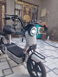 دراجة شحن • حجم ١٤ • بطاريات جديدة