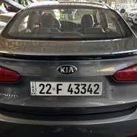 كيا سيراتو 2016 خليجي بيهة صبغ بنيد اثر جراد و جاملغ خلفي  السيارة حلو...