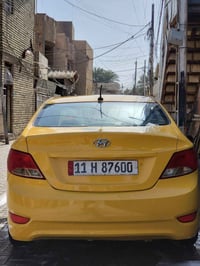 اكسنت مديل 2015 وارد امريكي رقم بغداد باسمي مكينة 1600سيارة معمرة جديد...