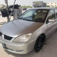 سیارە لانسەر مودیل ٢٠١٠ گیڕو مەكینە بە شەرت   چوار جام كارەبایی  دەشبو...