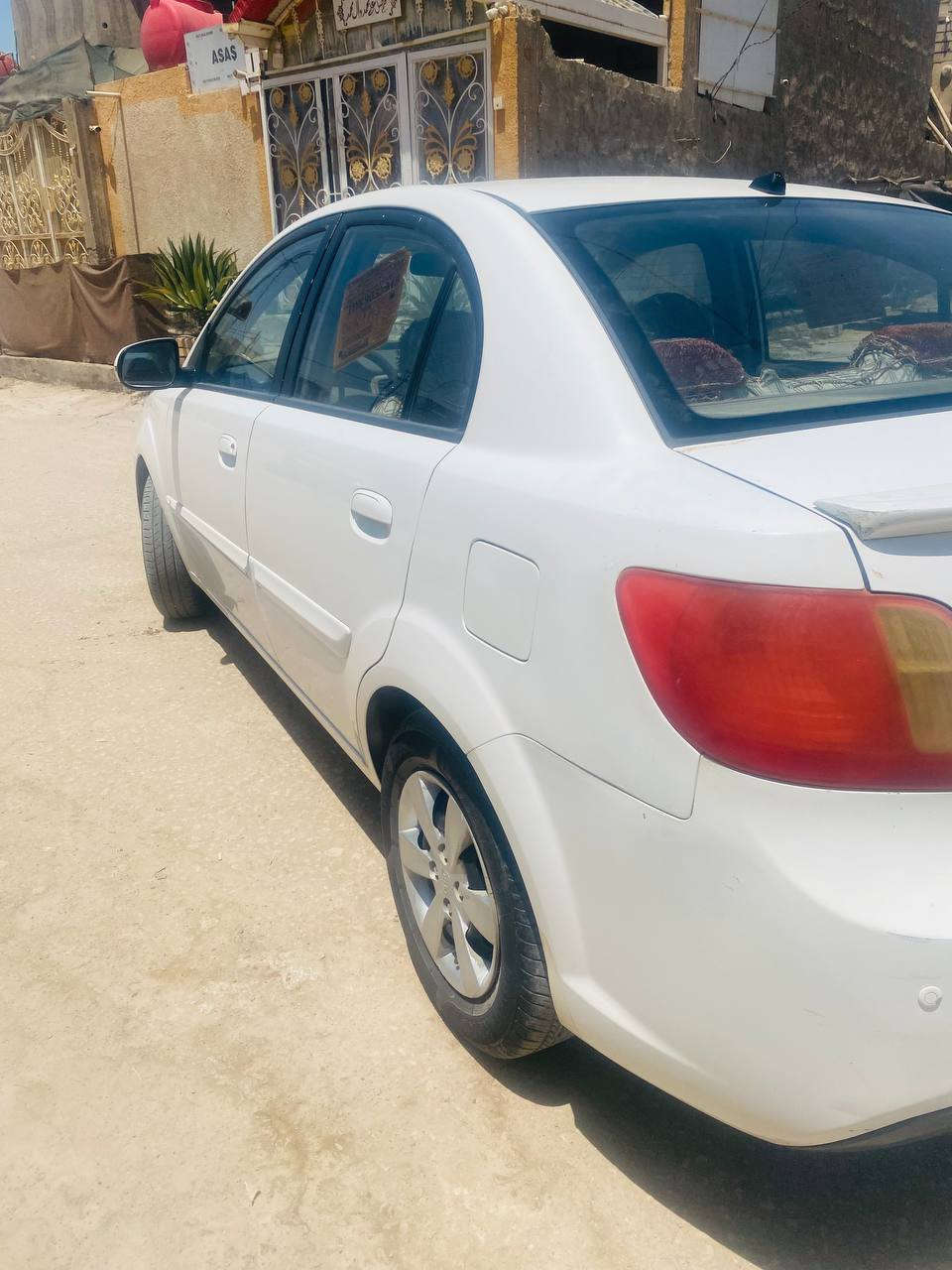 ريوا ٢٠١١ سياره مكفوله من الضربه والصبغ والتبديل كامره خلفيه حساسات شاشه DVD تبريد شغال  مكينه ١٤٠٠ المحسن رقم اربيل تحويل مباشر السعر ٨٥  العنوان النجف العباسيه رقم الهاتف ***********
