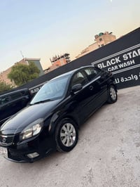 كيا ريو 2012 خليجي مكفوله من الصبغ  تحكم جهتين   فتحه سلايد  كير اوتما...