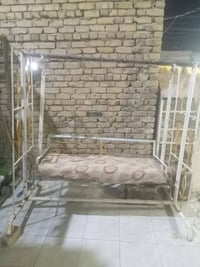 مرجوحة • حديد